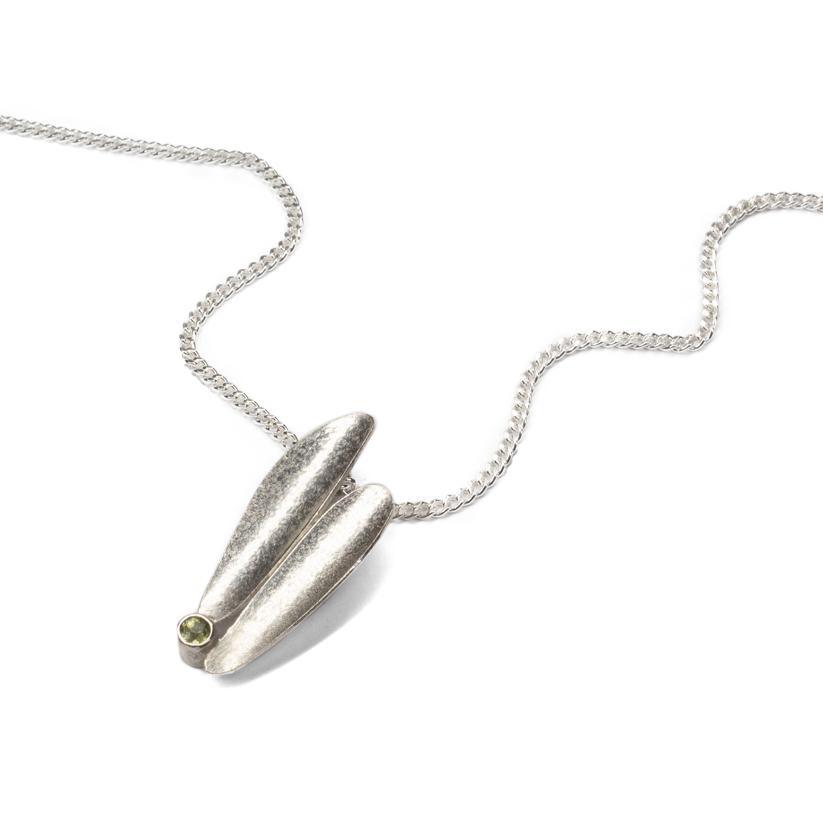 Lustre silver and peridot pendant